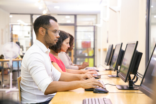 person taking the florida real estate exam at computer